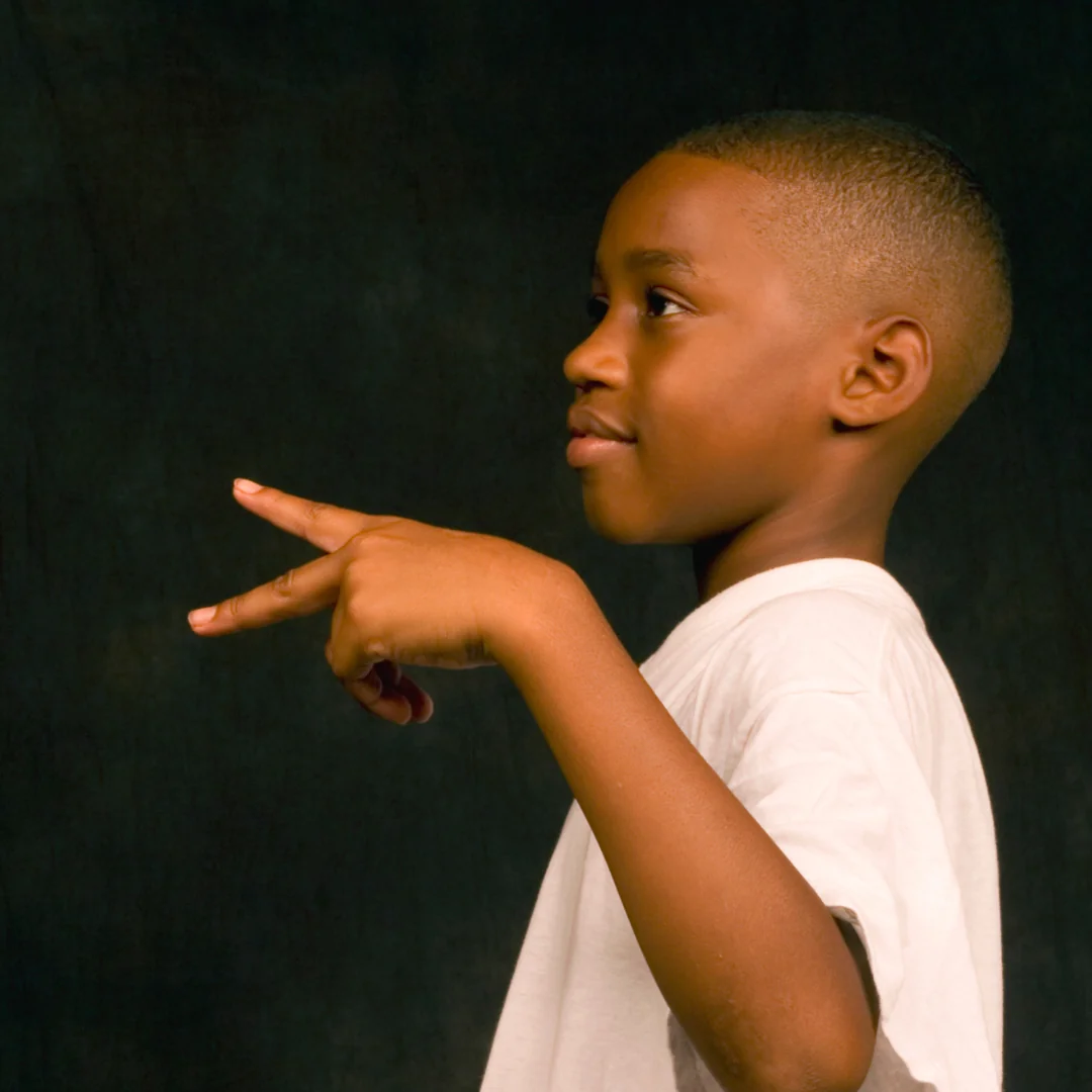 Young person engaged and focused in a programme session